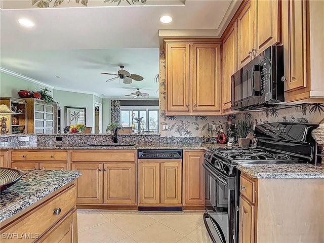11256 Bienvenida Way Unit 6D, Fort Myers, FL 33908 - kitchen featuring black appliances, a sink, a ceiling fan, dark stone counters, and crown molding