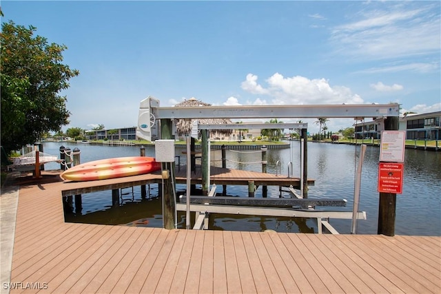 5105 Rutland Ct, Cape Coral, FL 33904 - dock with boat lift and a water view