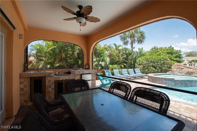 5105 Rutland Ct, Cape Coral, FL 33904 - view of patio featuring outdoor dining area, an in-ground hot tub, area for grilling, and a ceiling fan