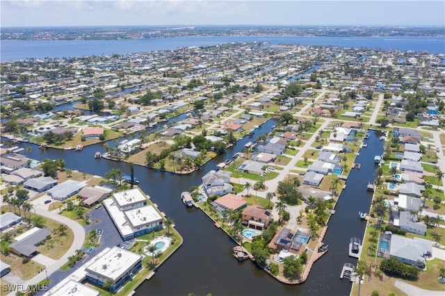 5105 Rutland Ct, Cape Coral, FL 33904 - aerial view of property's location featuring nearby suburban area and a large body of water