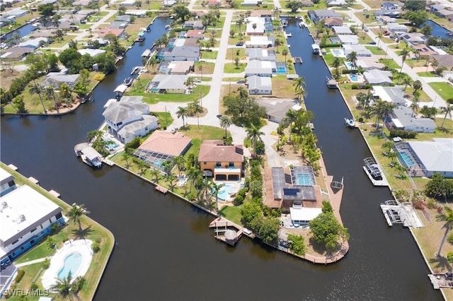 5105 Rutland Ct, Cape Coral, FL 33904 - aerial view of property's location featuring a large body of water and nearby suburban area