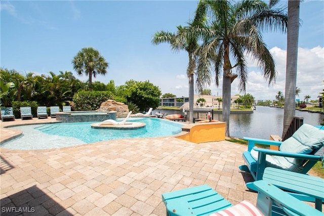 5105 Rutland Ct, Cape Coral, FL 33904 - view of pool featuring a patio area, a water view, and a pool with connected hot tub