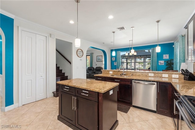 5105 Rutland Ct, Cape Coral, FL 33904 - kitchen with stainless steel dishwasher, a sink, ornamental molding, dark brown cabinets, and light tile patterned flooring