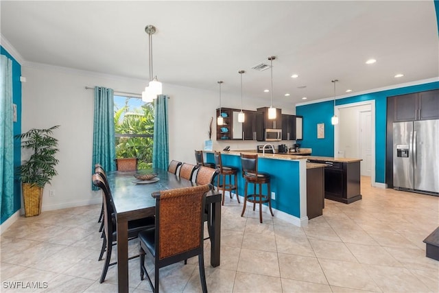 5105 Rutland Ct, Cape Coral, FL 33904 - dining area with ornamental molding, light tile patterned floors, recessed lighting, and baseboards