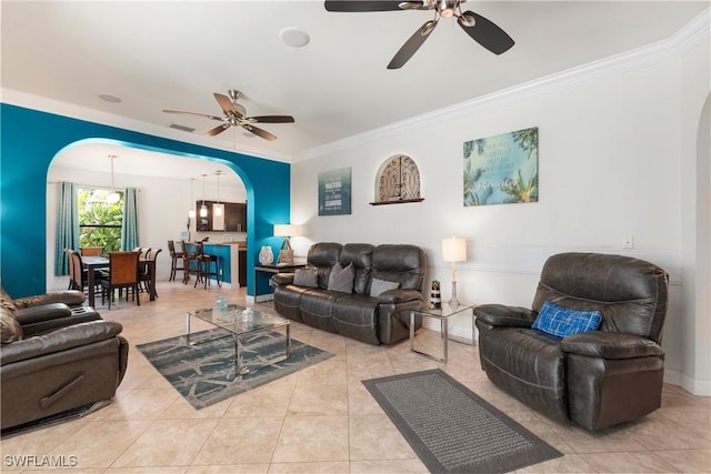 5105 Rutland Ct, Cape Coral, FL 33904 - living area featuring arched walkways, a ceiling fan, ornamental molding, and tile patterned flooring