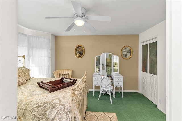 carpeted bedroom featuring ceiling fan and baseboards