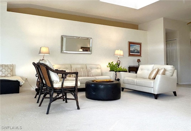 living area featuring carpet flooring