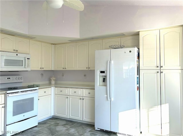 kitchen with white appliances and light countertops
