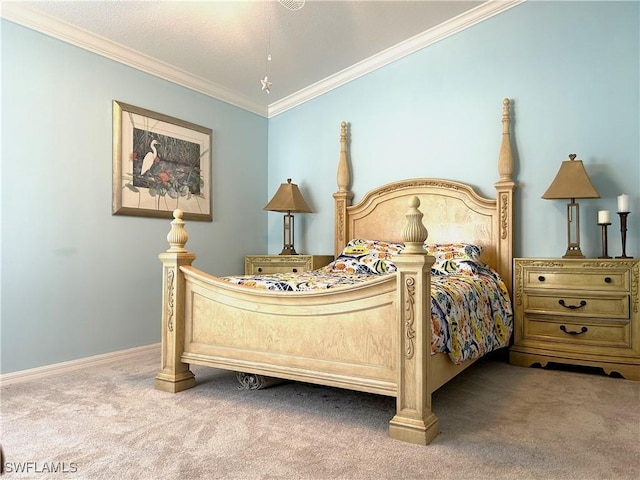 carpeted bedroom with ornamental molding and baseboards