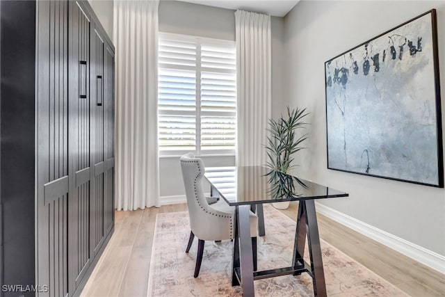 14179 Charthouse Ct, Naples, FL 34114 - home office featuring light wood-type flooring and baseboards