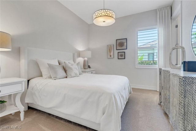 14179 Charthouse Ct, Naples, FL 34114 - bedroom with light carpet and baseboards