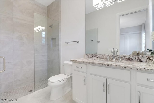 14179 Charthouse Ct, Naples, FL 34114 - full bathroom featuring toilet, tiled shower, and vanity