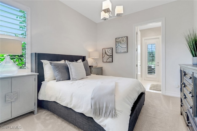 14179 Charthouse Ct, Naples, FL 34114 - bedroom with light colored carpet, baseboards, and vaulted ceiling