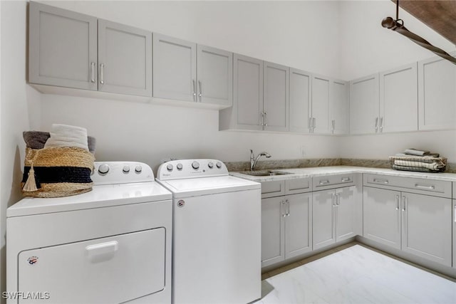 14179 Charthouse Ct, Naples, FL 34114 - laundry room featuring cabinet space and washer and clothes dryer