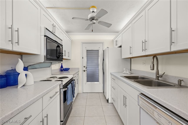2150 Gulf Shore Blvd N Unit 701, Naples, FL 34103 - kitchen with white appliances, a sink, white cabinets, ornamental molding, and light countertops