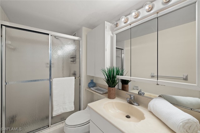 2150 Gulf Shore Blvd N Unit 701, Naples, FL 34103 - full bath with a stall shower, toilet, and vanity