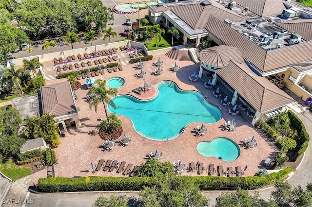 drone / aerial view of a pool