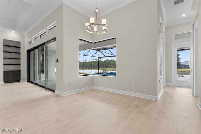 unfurnished dining area with light wood-type flooring, ornamental molding, a chandelier, baseboards, and recessed lighting