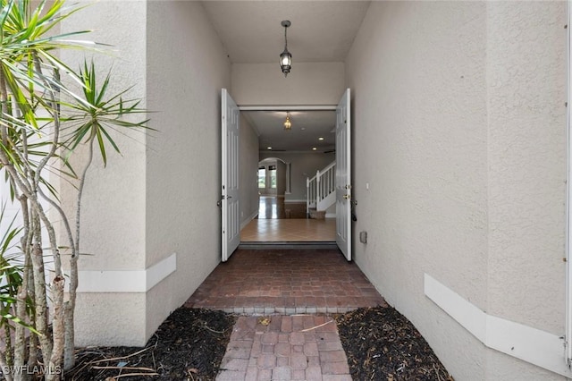 10310 Carolina Willow Dr, Fort Myers, FL 33913 - doorway to property featuring stucco siding
