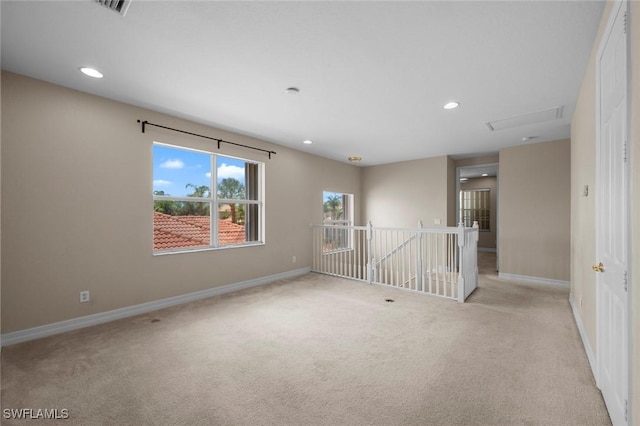 10310 Carolina Willow Dr, Fort Myers, FL 33913 - spare room featuring light colored carpet, baseboards, and recessed lighting