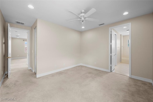 10310 Carolina Willow Dr, Fort Myers, FL 33913 - spare room with light carpet, a ceiling fan, recessed lighting, and baseboards