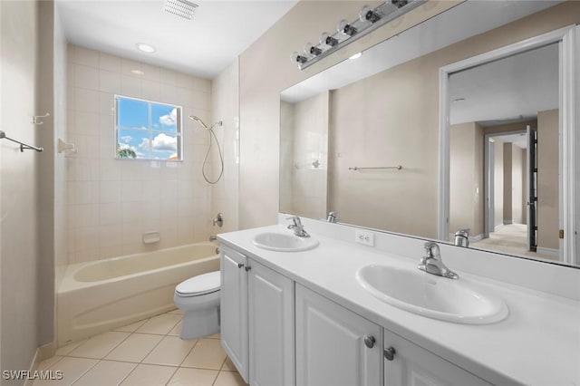 10310 Carolina Willow Dr, Fort Myers, FL 33913 - bathroom featuring tile patterned floors, toilet, double vanity, and shower / bath combination