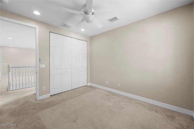 10310 Carolina Willow Dr, Fort Myers, FL 33913 - unfurnished bedroom featuring light colored carpet, baseboards, a closet, recessed lighting, and a ceiling fan
