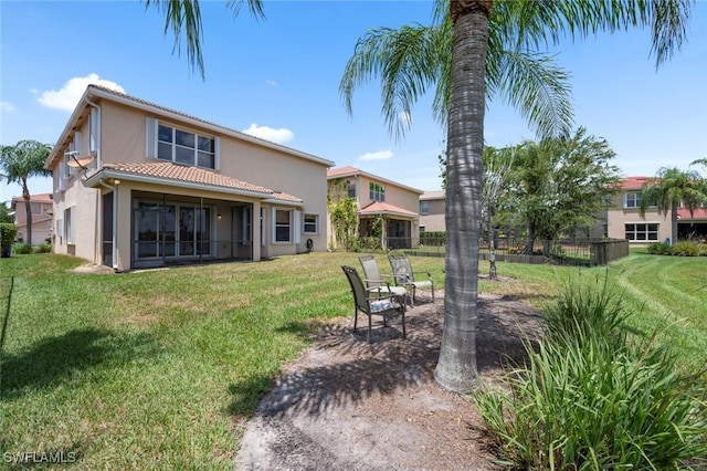 10310 Carolina Willow Dr, Fort Myers, FL 33913 - back of house featuring stucco siding and a tile roof