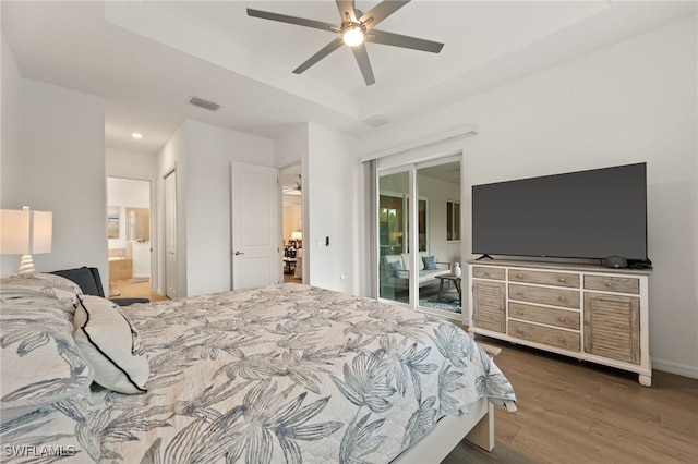 14860 Cherry Blossom Way, Punta Gorda, FL 33955 - bedroom featuring access to exterior, wood finished floors, ensuite bath, recessed lighting, and ceiling fan