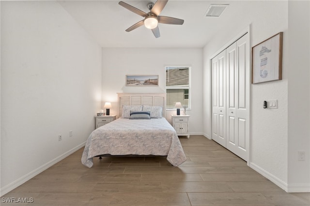 14860 Cherry Blossom Way, Punta Gorda, FL 33955 - bedroom with wood finished floors, baseboards, a closet, and ceiling fan
