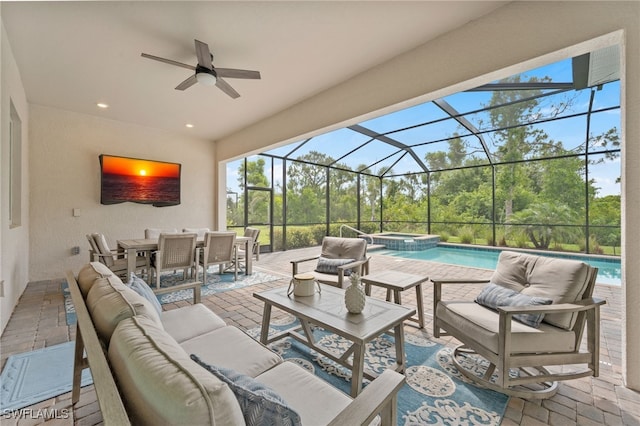 14860 Cherry Blossom Way, Punta Gorda, FL 33955 - view of patio / terrace with an outdoor living space, outdoor dining area, a ceiling fan, glass enclosure, and a pool with connected hot tub