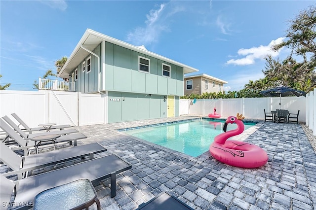 114 Lovers Ln, Fort Myers Beach, FL 33931 - view of pool featuring a patio area and a fenced backyard