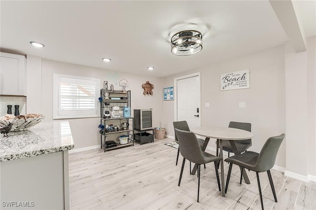 114 Lovers Ln, Fort Myers Beach, FL 33931 - dining room with light wood finished floors, baseboards, and recessed lighting