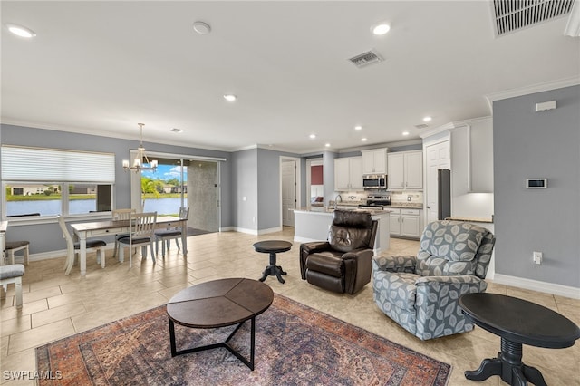 living area featuring baseboards, a chandelier, crown molding, and recessed lighting