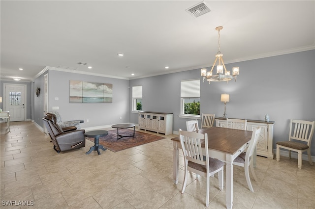 dining room featuring ornamental molding, a chandelier, recessed lighting, and baseboards