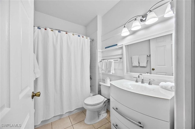 bathroom featuring tile patterned floors, vanity, toilet, and shower / bath combo