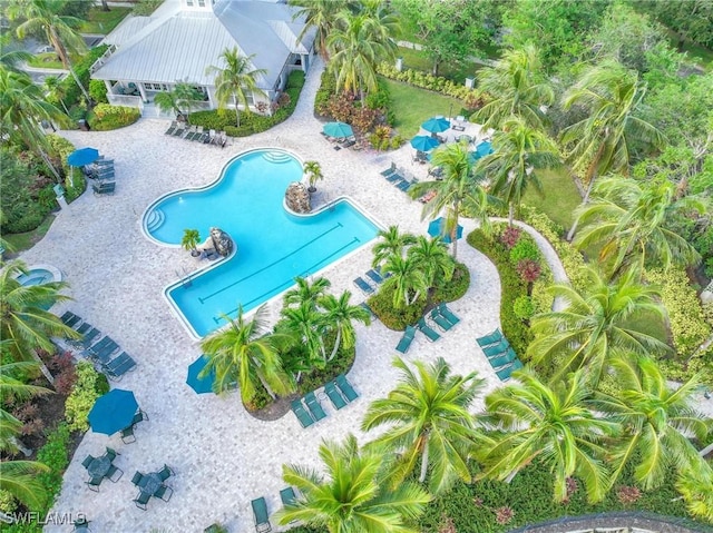 drone / aerial view of a pool