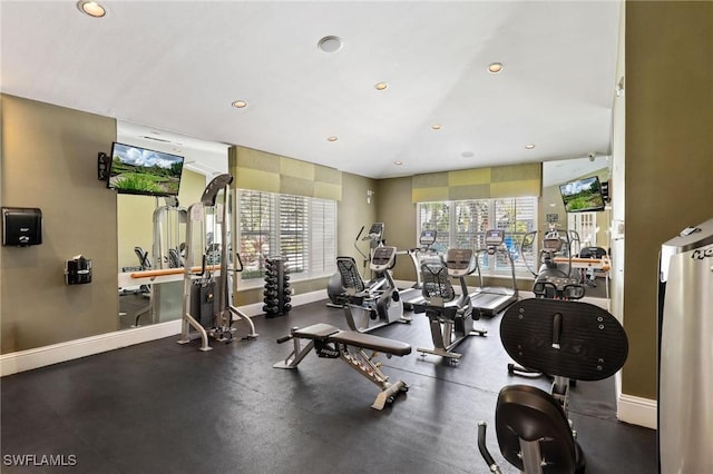 workout area with recessed lighting and baseboards