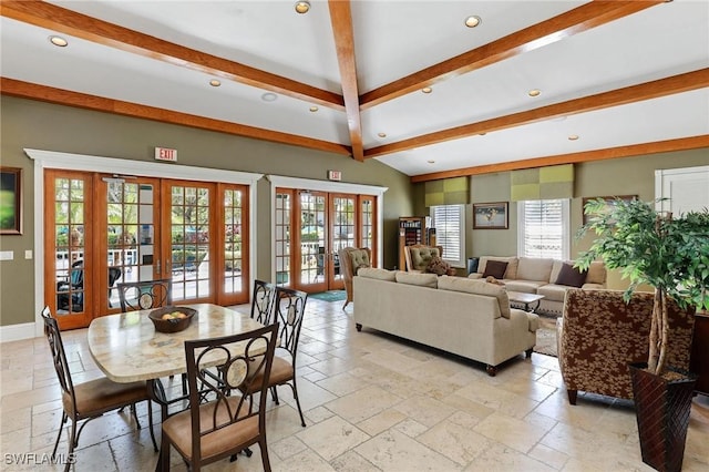 living area with french doors, stone tile flooring, recessed lighting, healthy amount of natural light, and beamed ceiling