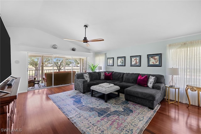 living room with lofted ceiling, ceiling fan, and wood finished floors