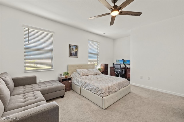 2780 Blossom Way, Naples, FL 34120 - bedroom featuring light carpet, baseboards, and a ceiling fan
