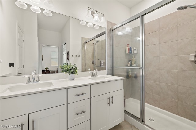 2780 Blossom Way, Naples, FL 34120 - bathroom featuring a stall shower and double vanity