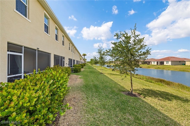 2780 Blossom Way, Naples, FL 34120 - view of grassy yard with a water view