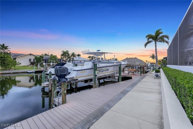 1428 SW 52nd Ln, Cape Coral, FL 33914 - dock area with boat lift and a water view