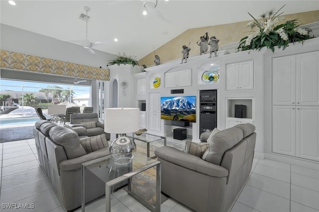 1428 SW 52nd Ln, Cape Coral, FL 33914 - living room featuring light tile patterned floors, arched walkways, high vaulted ceiling, a ceiling fan, and recessed lighting