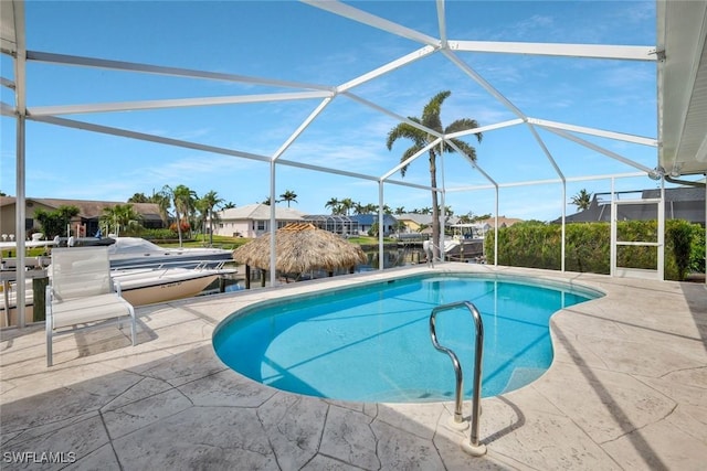1428 SW 52nd Ln, Cape Coral, FL 33914 - swimming pool with a patio, a lanai, and a residential view