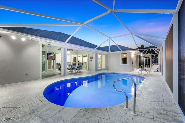 1428 SW 52nd Ln, Cape Coral, FL 33914 - swimming pool featuring a patio area and glass enclosure