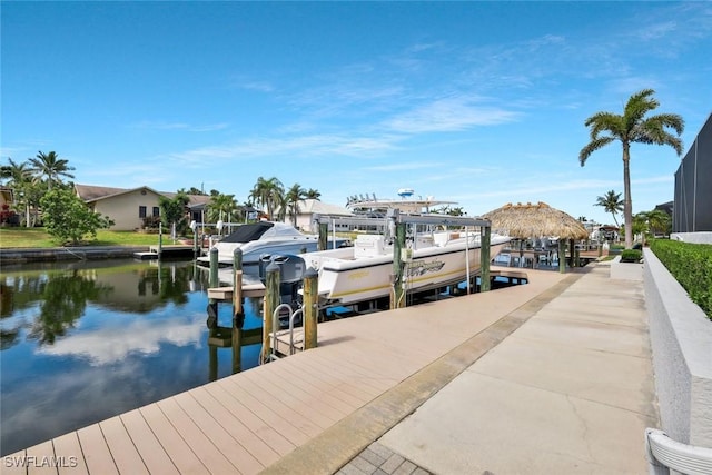 1428 SW 52nd Ln, Cape Coral, FL 33914 - dock area featuring boat lift and a water view