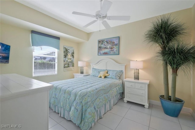 1428 SW 52nd Ln, Cape Coral, FL 33914 - bedroom featuring light tile patterned flooring, baseboards, and ceiling fan