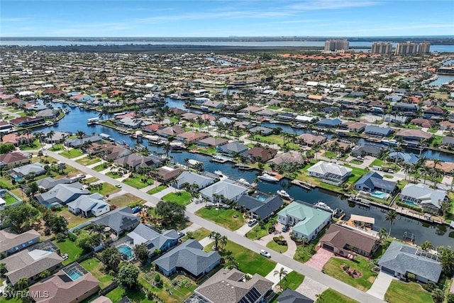 1428 SW 52nd Ln, Cape Coral, FL 33914 - aerial view of property's location with nearby suburban area and a nearby body of water